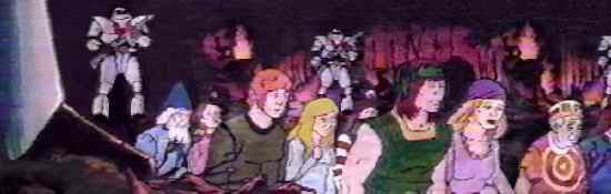 (Still from opening titles to first 'She-Ra' episode: slaves being marched through wilderness by evil Hordesmen.)